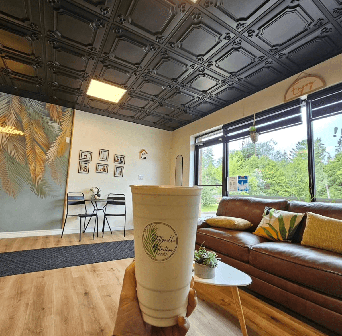 Protein shake inside the cozy lounge area at Stittsville Nutrition